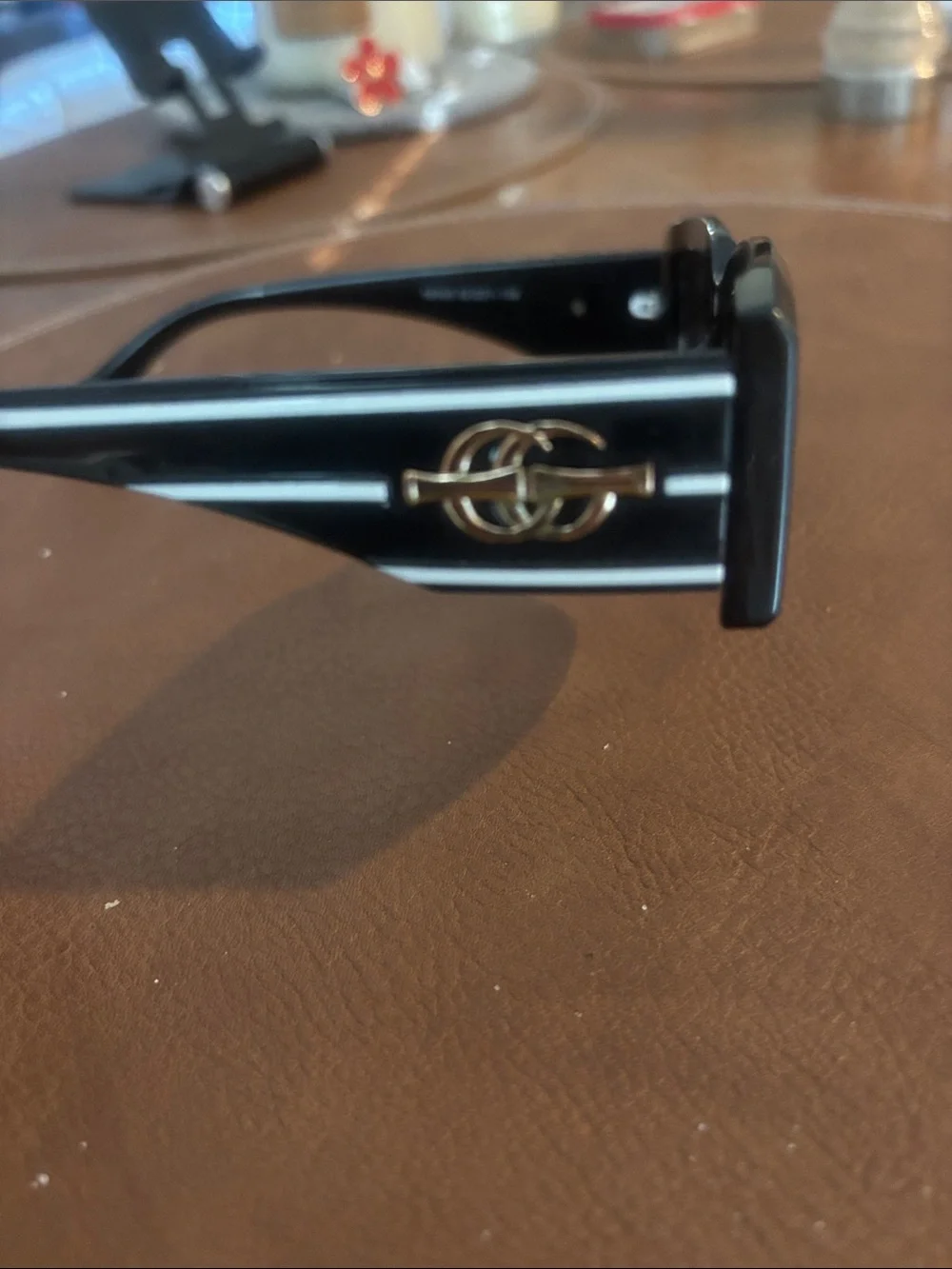 Black Rectangular Sunglasses with Gold Logo Accent